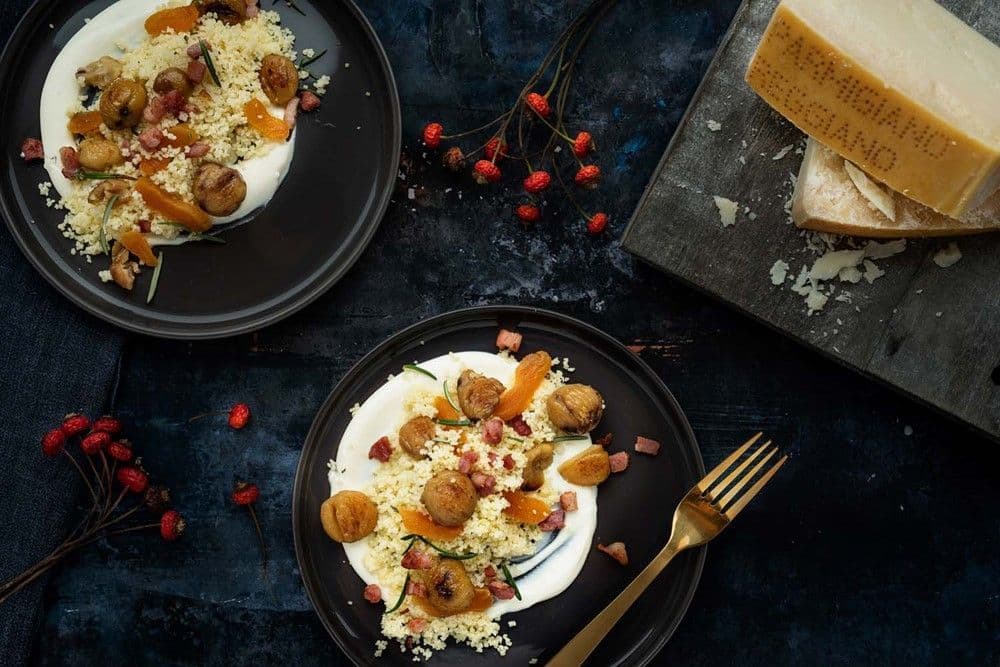 Castagne arrosto, cous cous, albicocche secche, salsa di Parmigiano Reggiano e timo