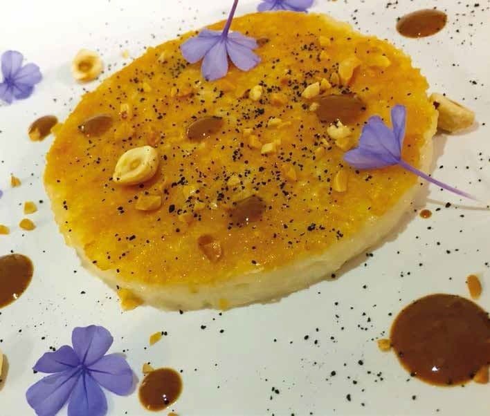 Riso al Parmigiano Reggiano “alla brace”, nocciole e liquirizia