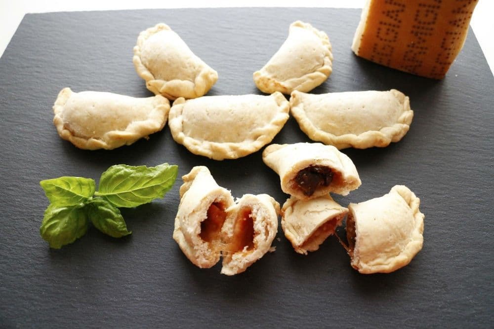 Empanadas stuffed with parmigiano reggiano and aubergine parmigiana - Argentina