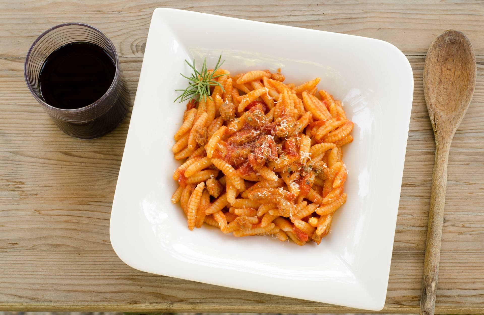 Malloreddus con ragù di salsiccia e Parmigiano Reggiano