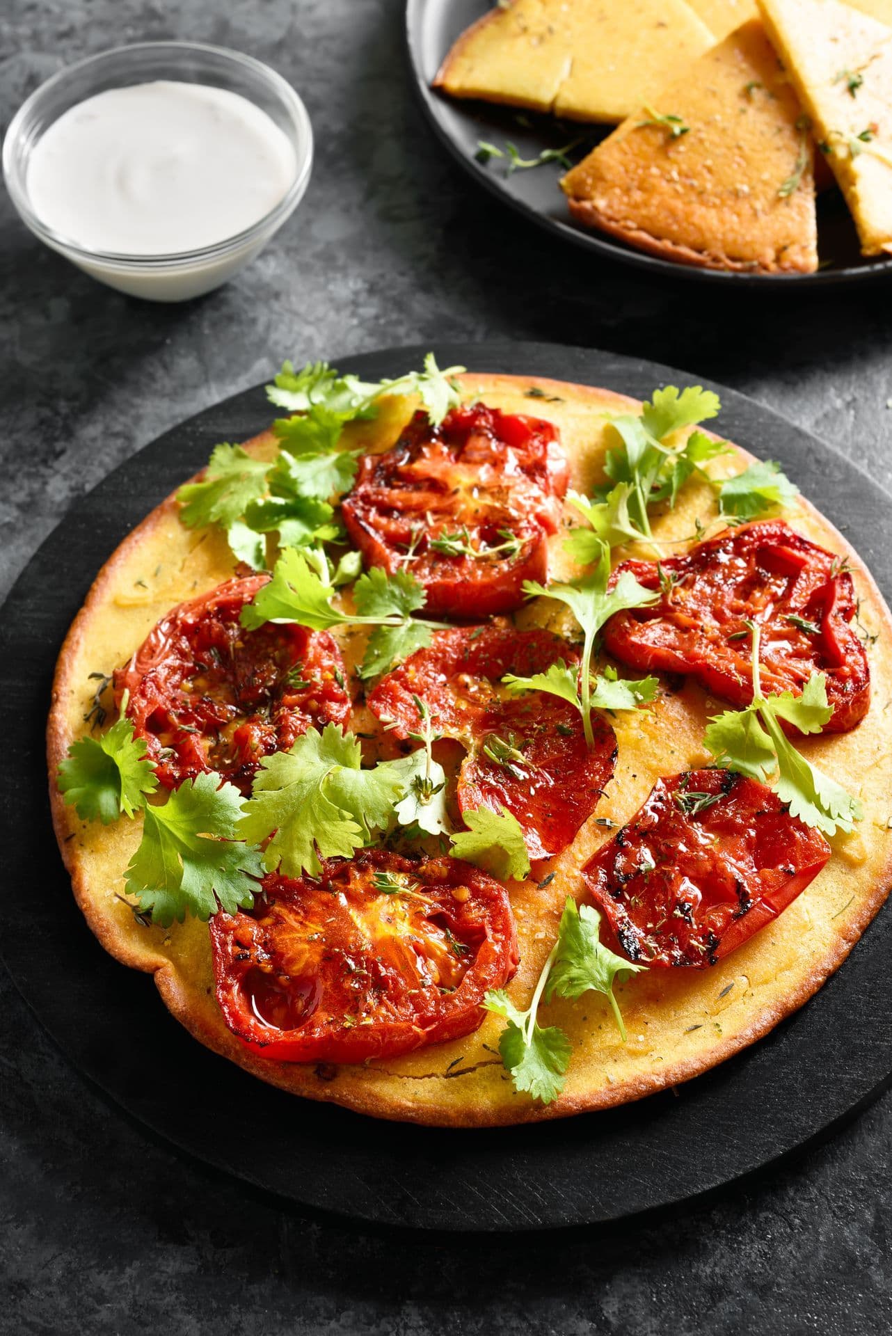 Farinata al forno con pomodori e Parmigiano Reggiano