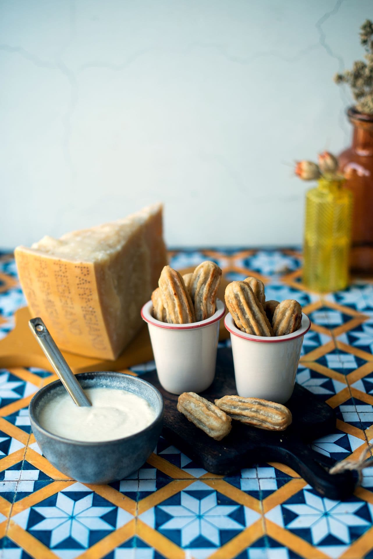 Churros con crema al Parmigiano Reggiano