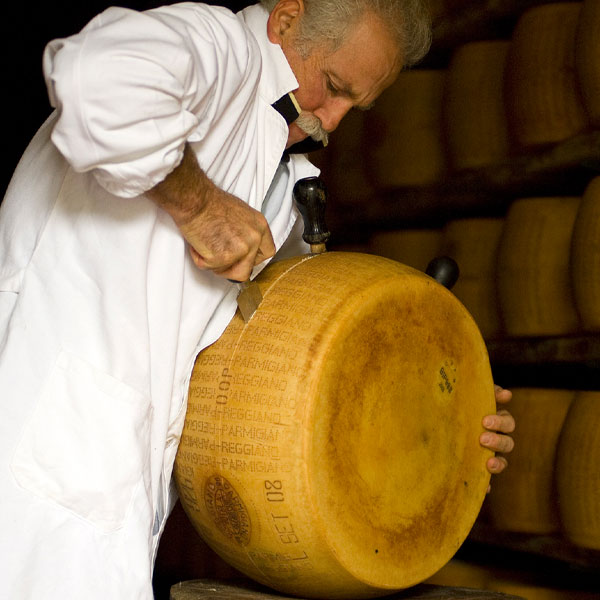See the art of cracking a wheel of Parmigiano-Reggiano at Whole